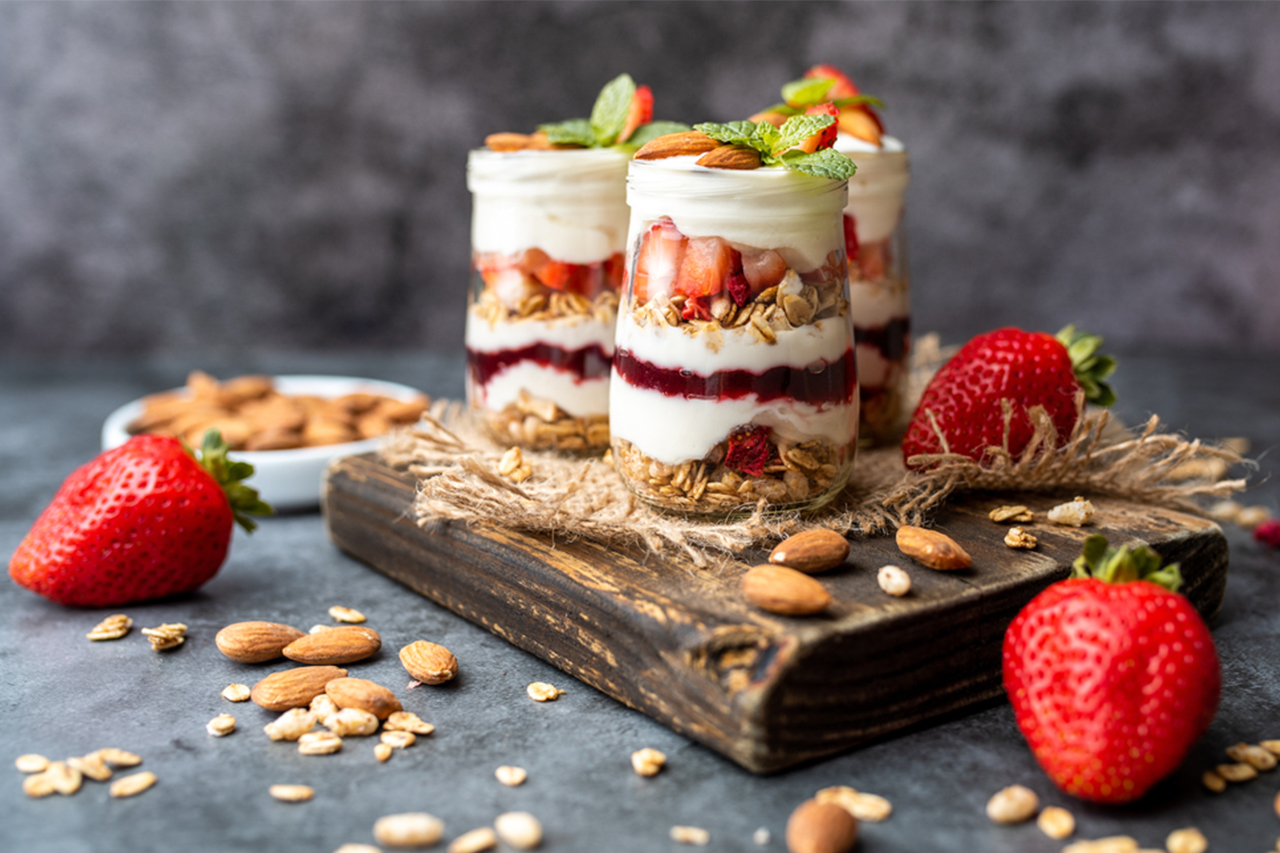 A couple holding hands in a sunset